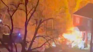 House explodes during police standoff as officers attempt to execute search warrant - Arlington, Virginia