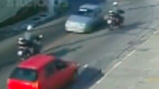 Drunk female driver hits police officer off his motorcycle in Osasco, Brazil