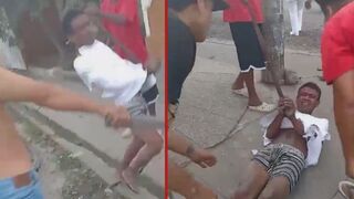 Thief was taped up and beaten by local residents - Brazil