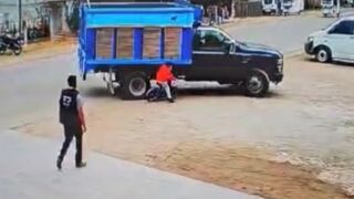 Young man got himself caught in a trucks wheel arch after collision