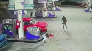 Gunman collects shell casings after shooting man dead at gas station - Ermelo, South Africa