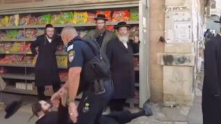 Violent police raid in jerusalem, palestinian flags removed and anti-zionist jews assaulted