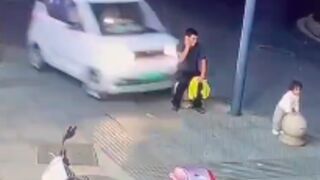 Father and daughter mowed down by oblivious driver in China