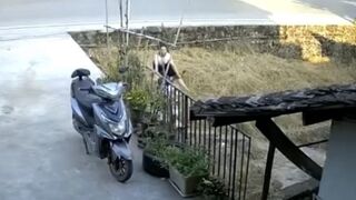 Scooter rider rides past junction and face plants into a wall in China [+ Aftermath]