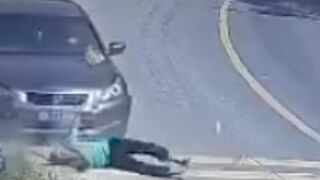 Biker was hit off his motorcycle and dragged several meters in China