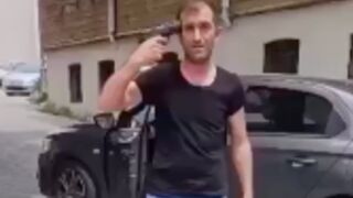 Man going through a divorce shoots himself in the head in front of wife who had a restraining order against him in Turkey