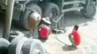 Mechanic and truck driver are killed after tire explodes in their faces in Vietnam