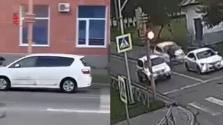 Pissed off woman travels with her husband on the hood of her car before rear-end collision in Russia