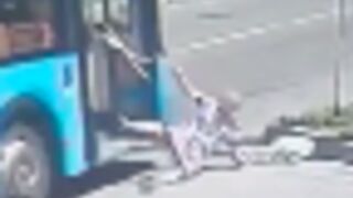 Elderly woman cracks her head open after falling from a bus in Russia