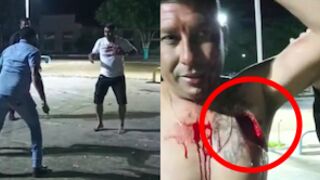 Two men get into a street fight before one pulls a knife out and slices his opponent in the chest