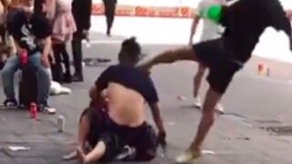 Young man is kicked in the face and knocked out after bullying homeless man in China