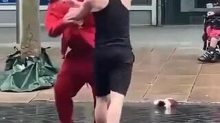 Man is knocked out during a street fight in the Uk