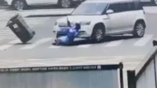 Elderly woman was crushed to death while crossing the street with a trash can