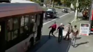 Man hits his friend then runs off into the road before getting hit by a bus