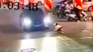 Young boy playing on his skateboard is crushed to death after entering the of a moving vehicle in China