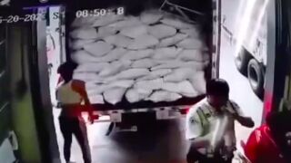 Worker is crushed against a wall by loading truck, Indonesia