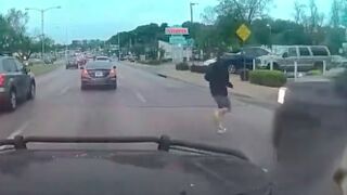 Oblivious jaywalker is is run over and killed