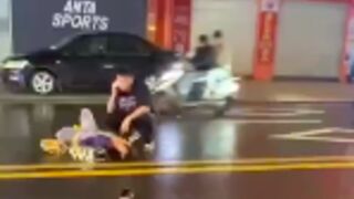 Man comforting his partner after she was run over, is run over again with him, China