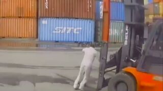 Elderly man is run over by a forklift in China