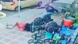 Hitman kicks his victim in the head in frustration after his gun jammed although the first shot still killed him