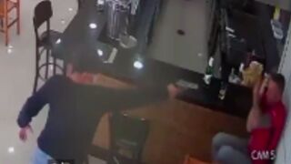 Man is shot at close range while sitting inside a cafe, Brazil