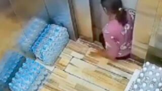 Woman gets stuck inside an elevator and escapes by jumping down the shaft, China
