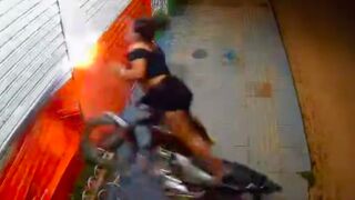 Helmetless drunk biker crashes into store shutters, Brazil
