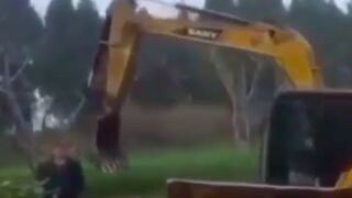 Man is killed after getting a excavator bucked swung into his head, China