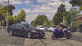 Biker pays the price for attempting to beat a red light