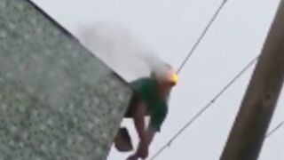 Man is electrocuted from the face after leaning over balcony and coming into contact with a high voltage cable