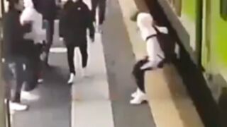 15 year old pushed into a train for refusing to hand over his sweatshirt, Italy