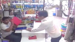 Customer destroys store worker with a machete, Pakistan