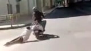 71-year-old man is dragged on the back of a scooter in India