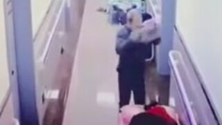 Elderly man smashes a brick over patients head at hospital in China