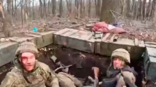 Two Russian soldiers are caught camping in a ditch and executed by Ukrainian soldiers