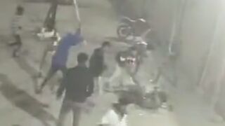 Gang member is surrounded and brutally beaten and killed by rival gang, India