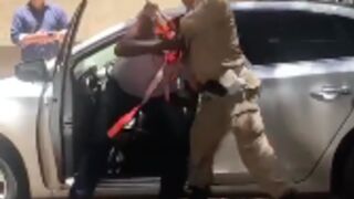 Police officer beats up driver then runs away!