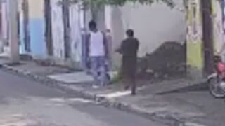 Man attempts to sneak up and shoot his victim from behind, but turns around and shoots him first in Dominican Republic