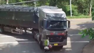 Woman gets crushed by trailer truck in Vietnam