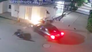 Car hits three people off a motorcycle and sends them flying