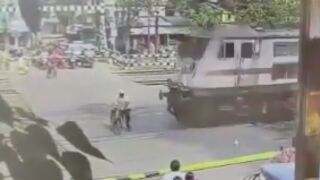 Man gets swept by a Train in Bangladesh