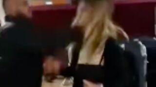 Woman runs her mouth up and gets boxed over in Germany