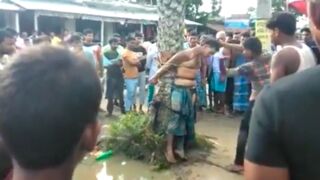 Man tied to a Tree slapped up and humiliated for rape in India