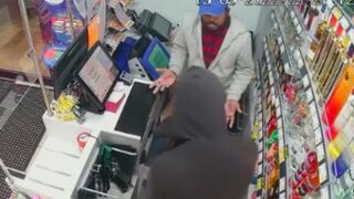 Shop owner disarms and fights off robber in the UK