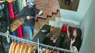 Karma for 3 robbers trying to stick up a clothing store in Brazil