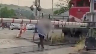 Distracted man gets hit by a train in Turkey
