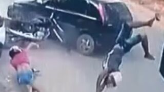 Couple get hit off a motorcycle seconds after committing a robbery in Brazil