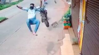 Man performs a front flip after getting into a motorcycle accident