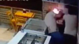 Restaurant worker gets shot in the face at close range trying to fight off a robber in Brazil