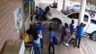 School students get crushed into a shop by a dangerous driver in Cura�ao